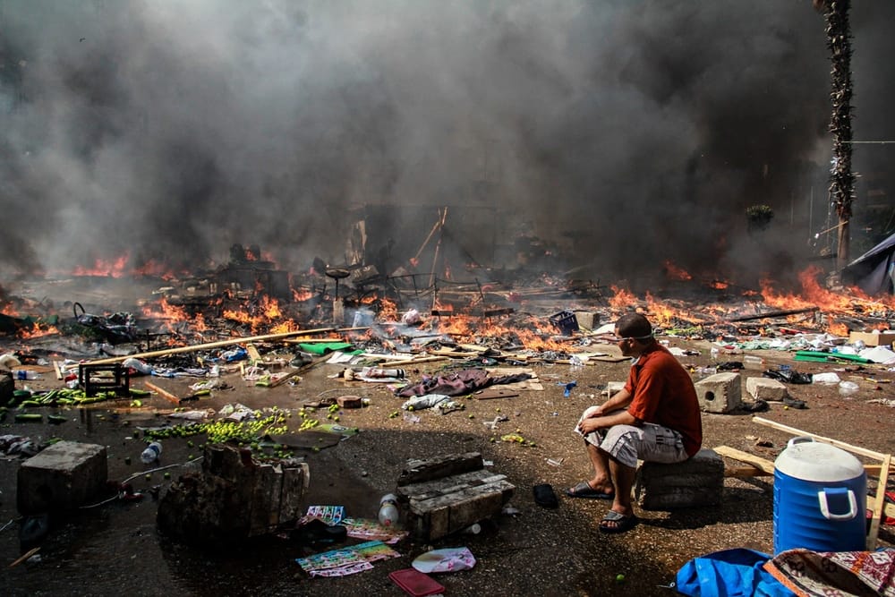 Why did Egyptians cheer a massacre?